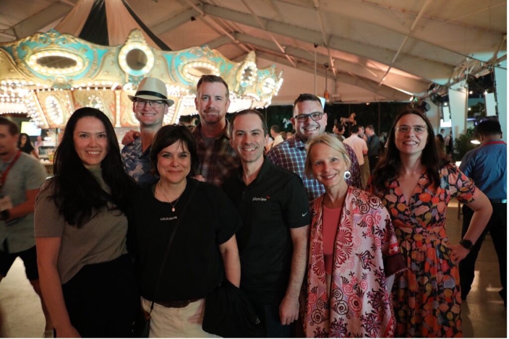 A picture of multiple people smiling at Planview Connect 2025