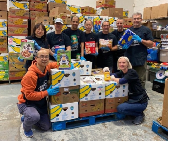 Photo of a grop of people at a food bank
